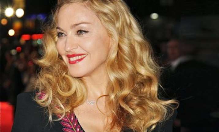 madonna talks musicality of w.e.