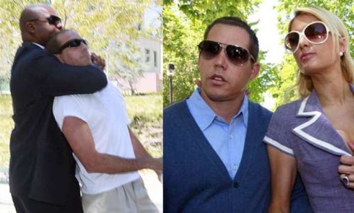 man tries to grab paris hilton s boyfriend