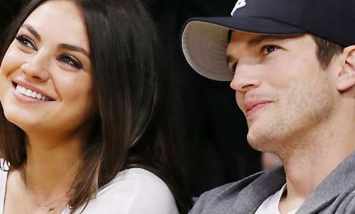 is kunis expecting first child with fiance kutcher