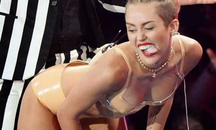 miley would prefer to go naked instead of crying in public