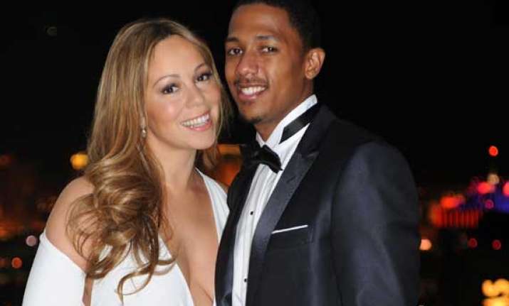 nick cannon praises wife mariah s pet care habit