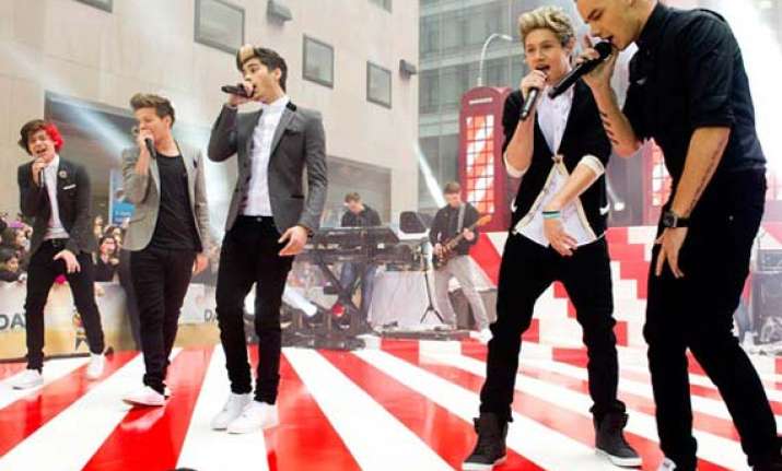 one direction reminds of rolling stones jagger