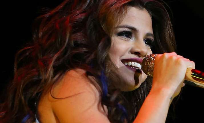 selena gomez slams fan for bullying