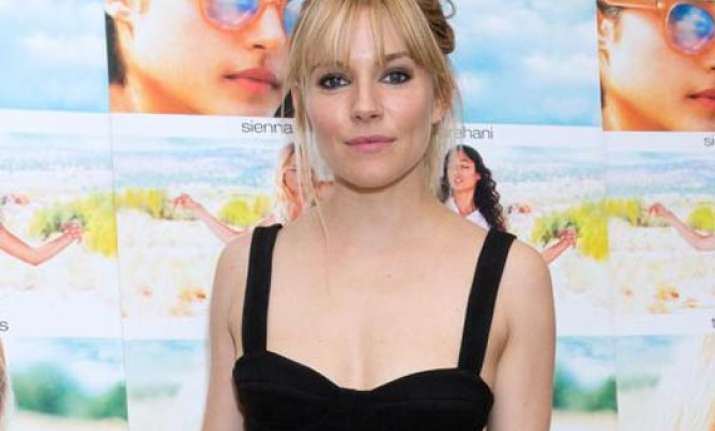 sienna miller s laid back personality affects style