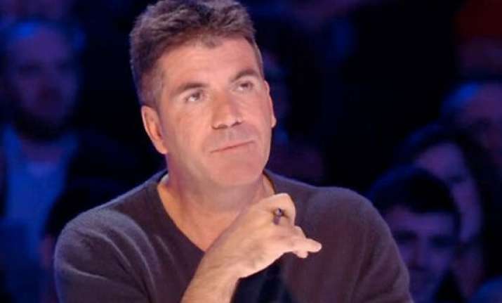 simon cowell to quit as judge on britain s got talent