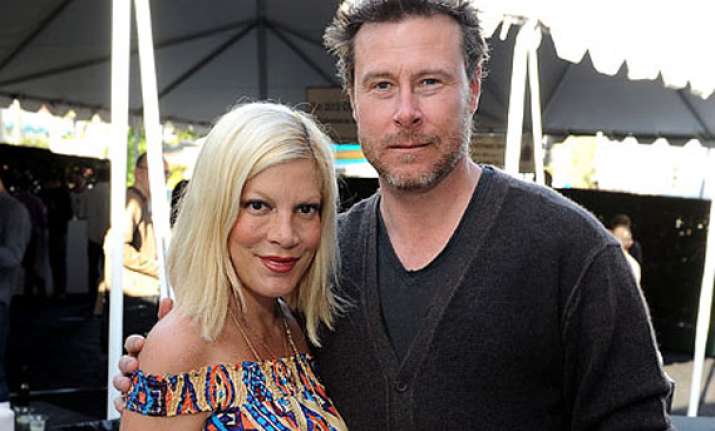 tori spelling announces she s expecting her fourth child
