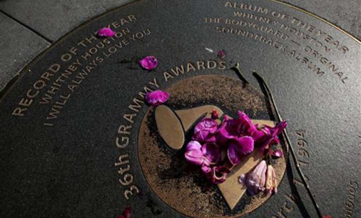 whitney houston remembered on grammys red carpet