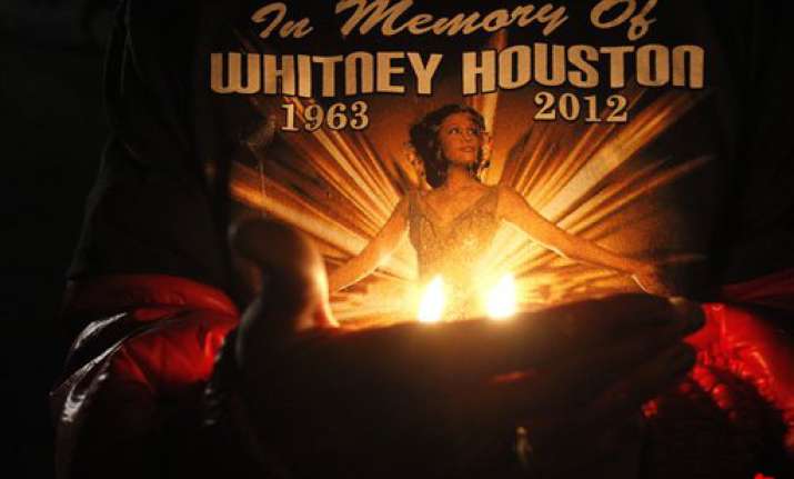 whitney houston s body headed home