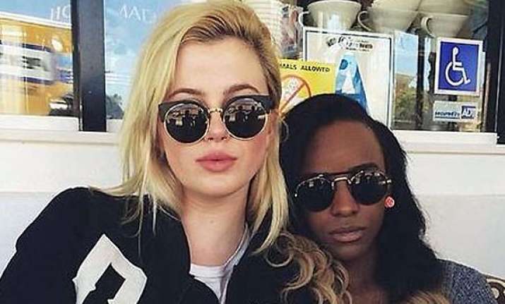 ireland baldwin confirms lesbian relationship rapper angel