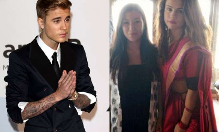 desi touch justin selena s indian jigs at separate events