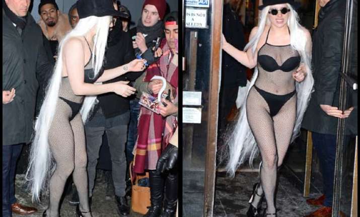 lady gaga dares to bare in fishnet stocking see pics