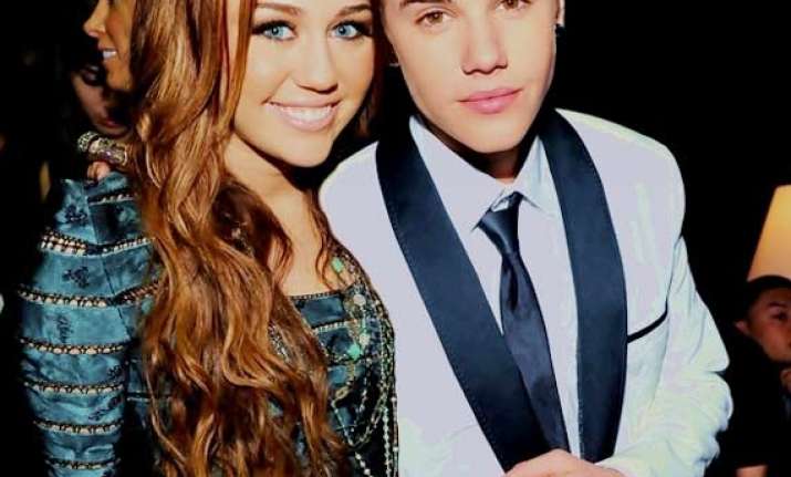justin bieber miley cyrus spat see pics