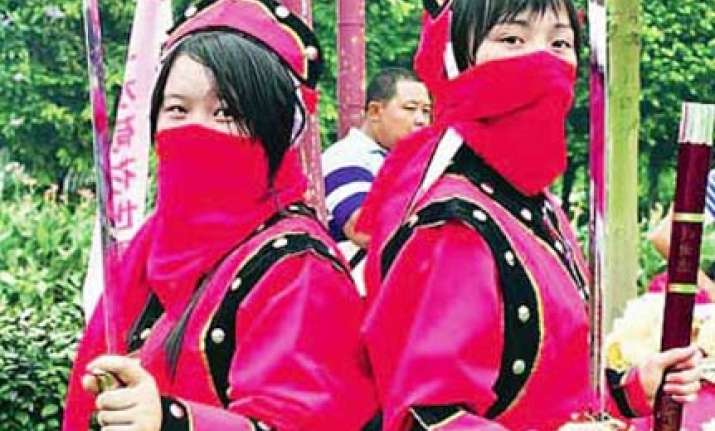 defeat us and then marry us say chinese kung fu sisters