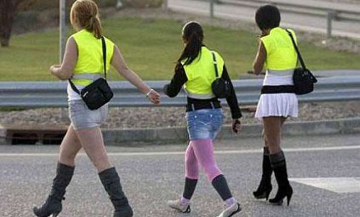 sex workers in spain asked to wear reflective vests for