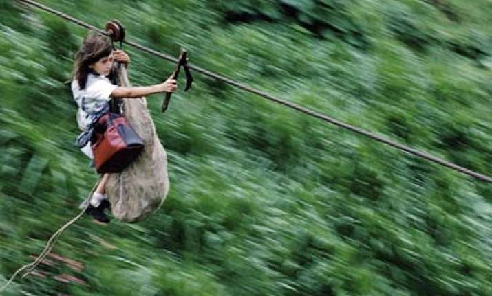 colombian kids go to school daily on ropeway pulley