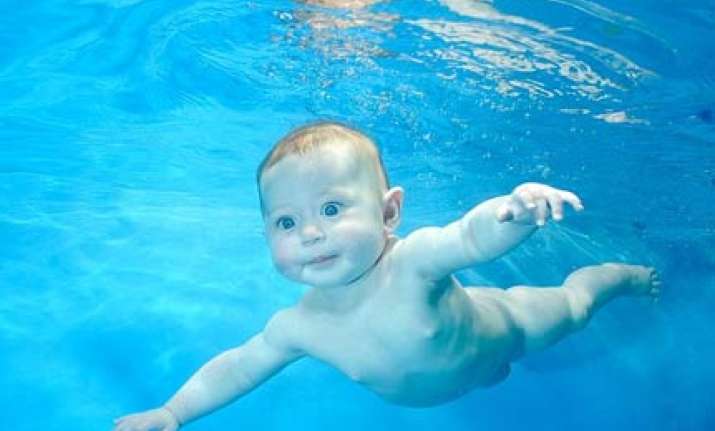 babies make a splash in london swimming school