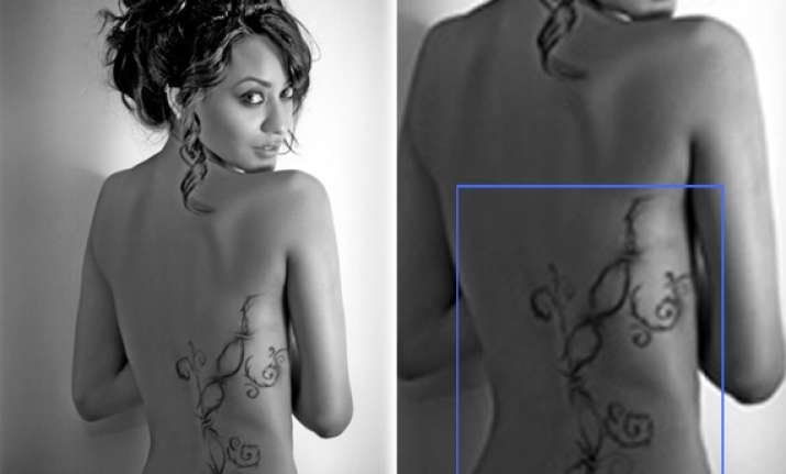 vedita shows off her tattooed bare back