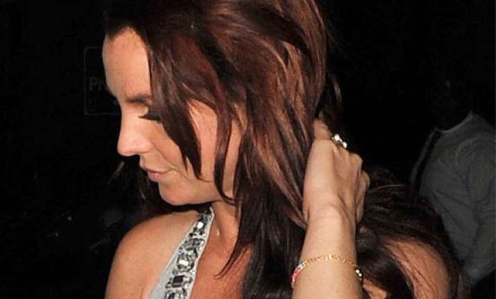 britney stuns in silver dress at sister s wedding see pics