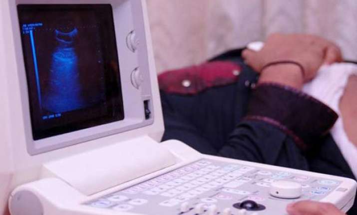 how a small tracking device installed in sonography machine