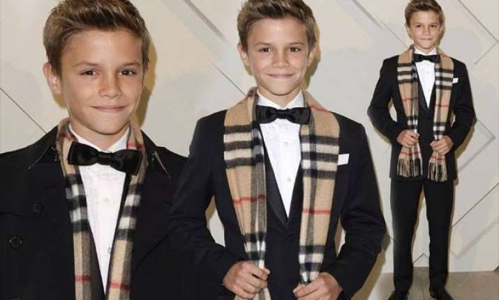 romeo beckham boosts burberry sales