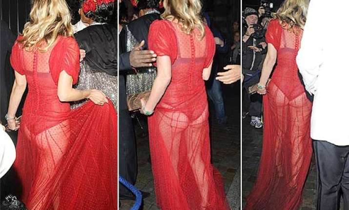 wardrobe malfunction kate moss flashes butts in a see