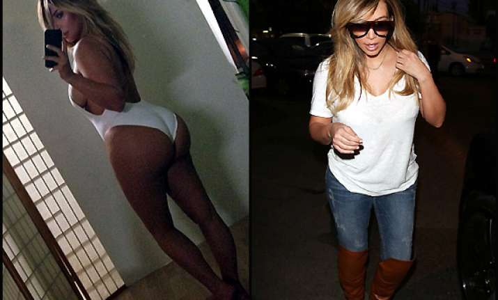 kim kardashian reveals her new post baby body credits