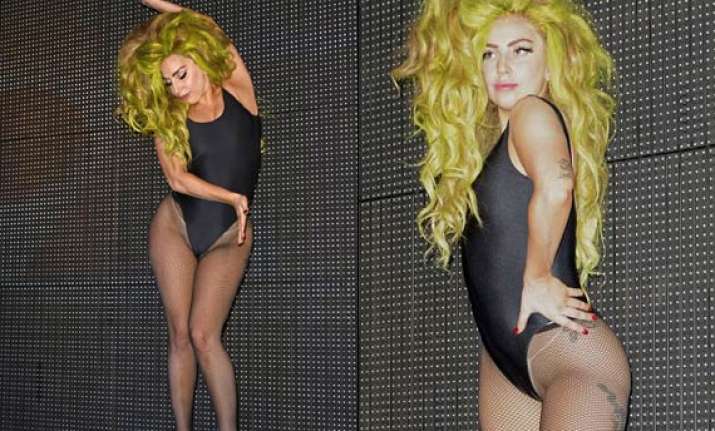 gaga outrageous act shows off her derriere in leotard see