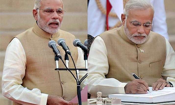 narendra modi chucks trademark half sleeve kurta for