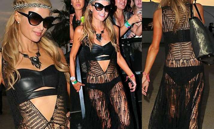 paris hilton dons hot leather bra at coachella festival