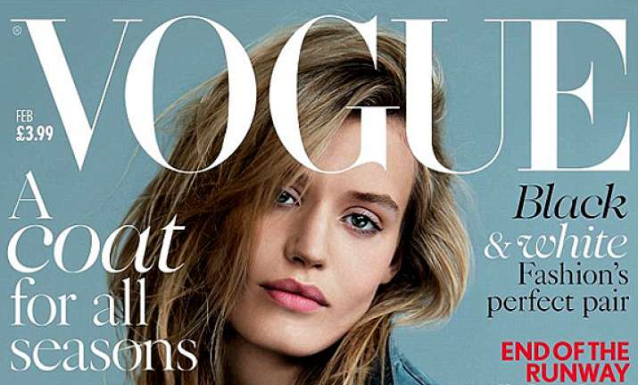 Georgia May Jaggers poses in just a denim jacket for Vogue