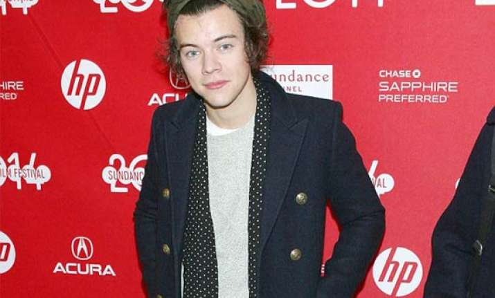 harry styles spends 20k pounds on love and sex