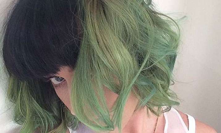 katy perry dyes her hair slime green