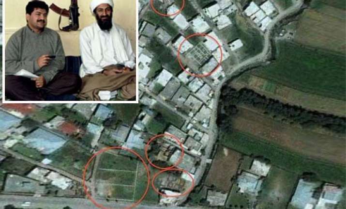 americans dragged my father s body on the stairs says laden