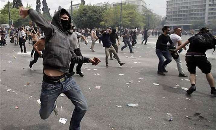 anti austerity protesters clash with police in greece