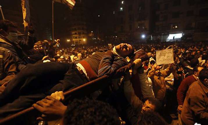 as crowds swell in cairo military in crisis talks