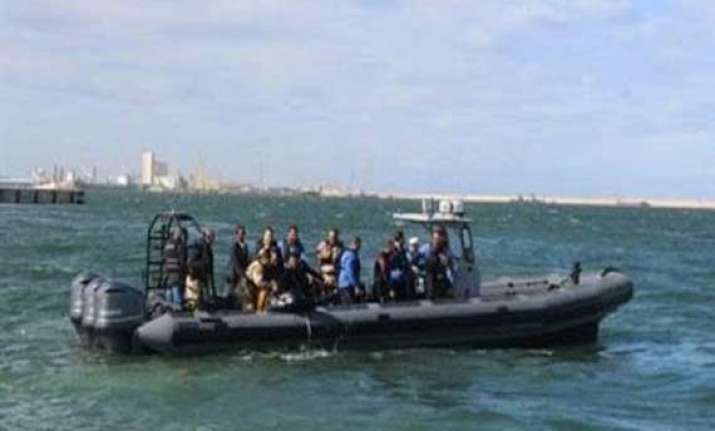 at least 20 dead dozens missing in shipwreck off libya