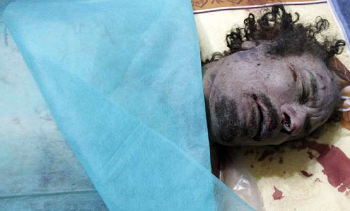 autopsy report says gaddafi killed by shot to head