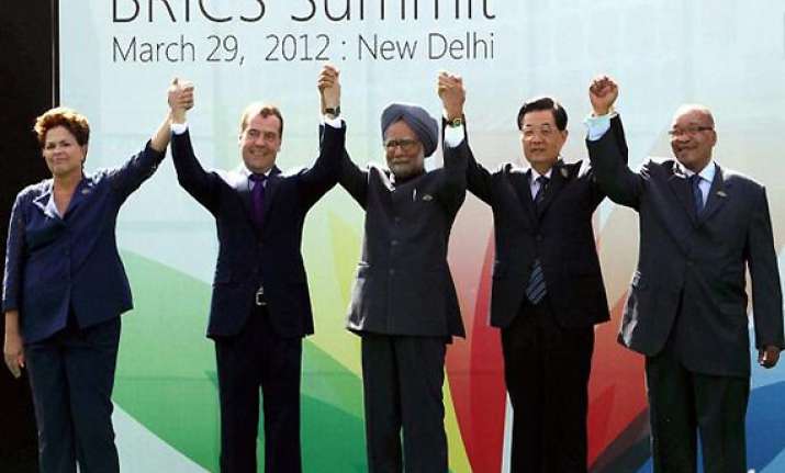 avoid disruptions to trade manmohan tells brics summit