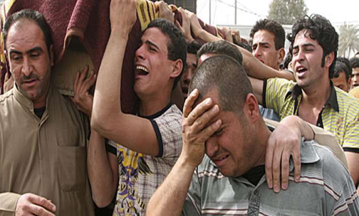 baghdad market bombs kill 14 wound more than 100