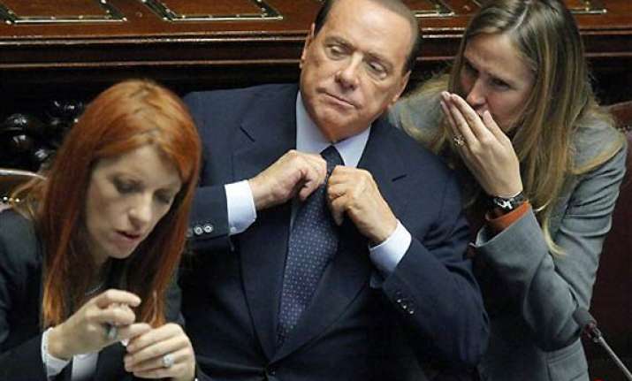 berlusconi wins confidence vote