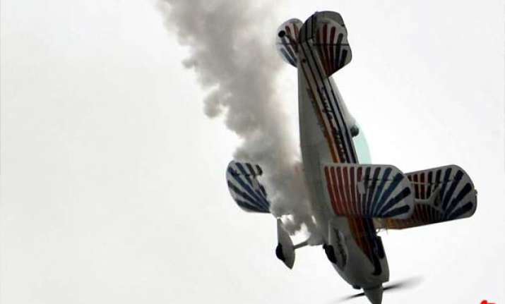 biplane crashes during air show plunges into river