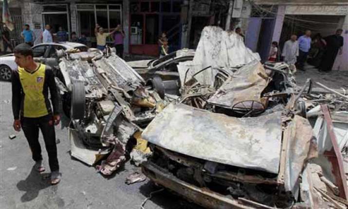 bombings kill at least 27 in baghdad