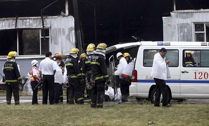 china attributes deadly factory blaze to negligence