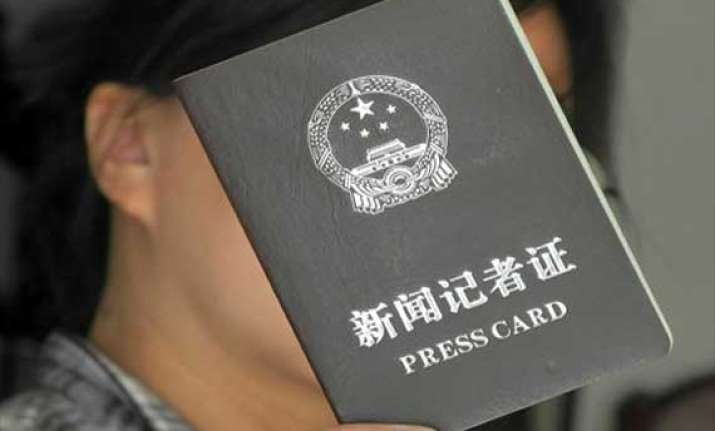 china cancels over 14 400 press cards for journalists