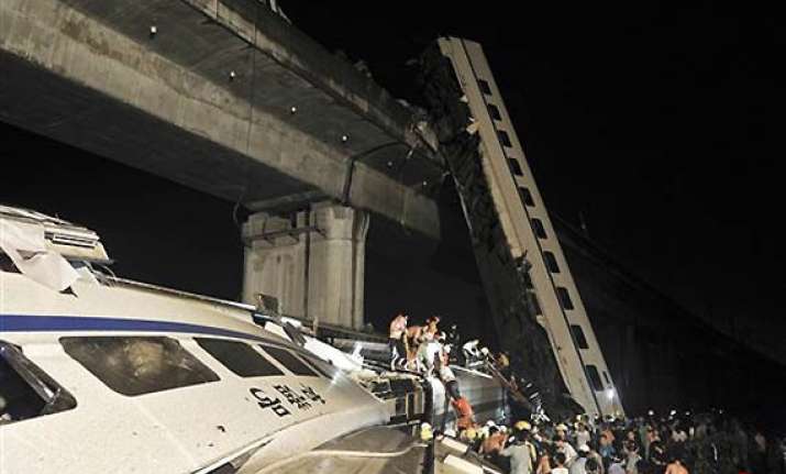 china bullet train derails coaches fall off bridge