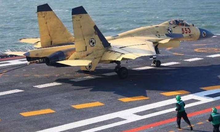 china must develop larger aircraft carriers says expert
