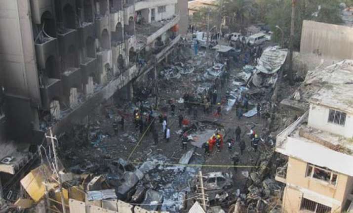 death toll rises to 32 in iraq cafe suicide bombing