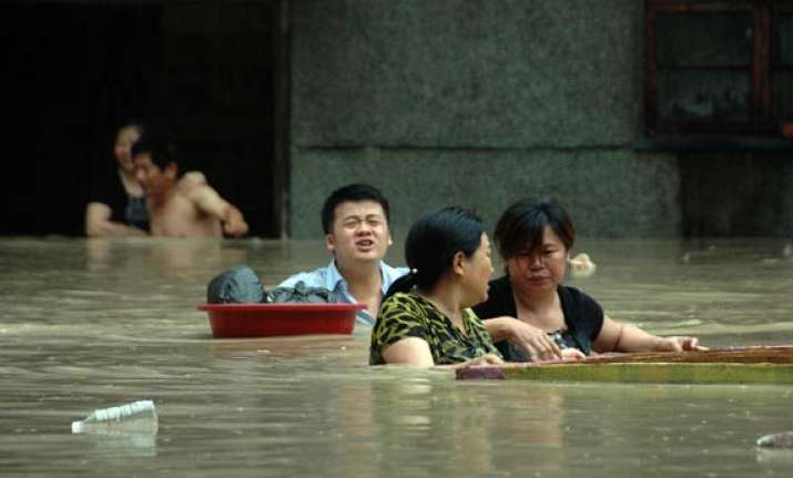 death toll in china floods rises to over 100