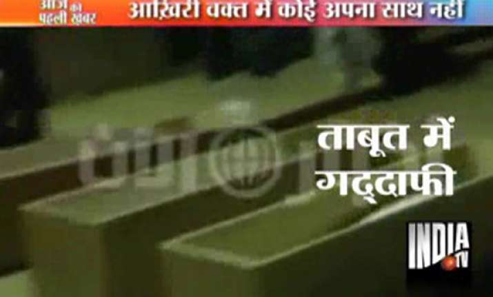 dubai based tv broadcasts amateur video of gaddafi s funeral