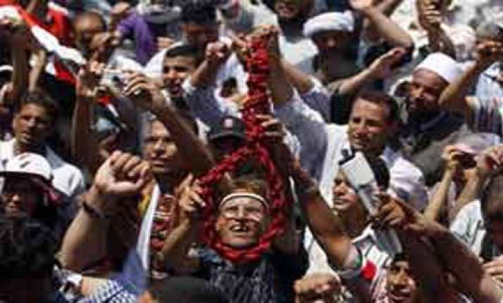 egypt pm sacks police officers accused of killing protesters